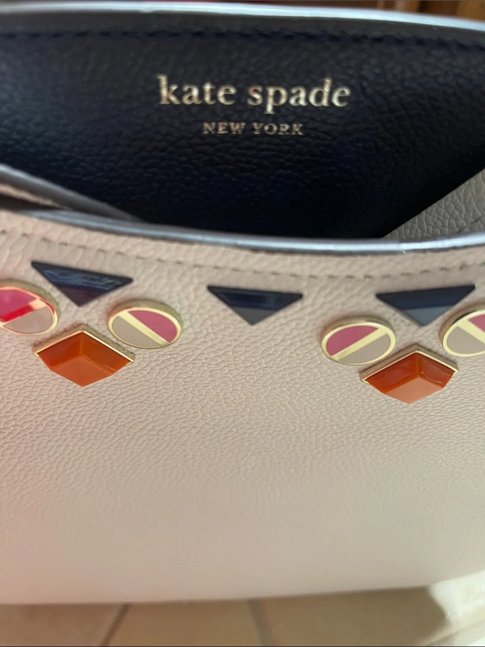 kate spade cream leather